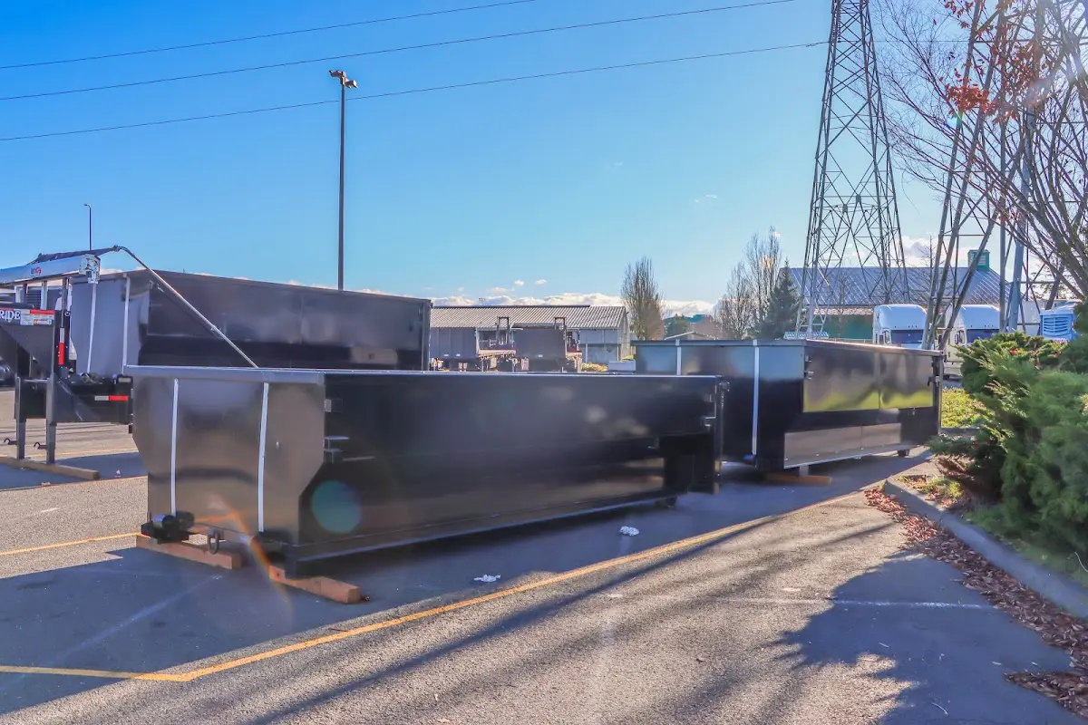 Roll-off dumpster ready for waste disposal at job site for 3 Yard Dumpster Rental in Totowa